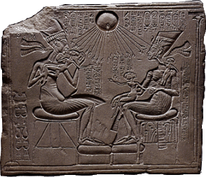 Akhenaten and Nefertiti dandling their infant on their needs. Family images like this are permitted in the revolutionary Amarna style.