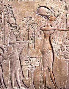 Akhenaten and Nefertiti leading in the celebration of the Aten at Aketaten, Akhenaten's new capital.