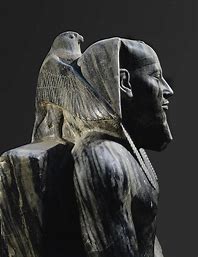 Khafre (Kephren) son of Cheops and builder of the second pyramid at Giza. Horus on his shoulder, this god king radiates the power and perfection of the Old Kingdom pharaohs.